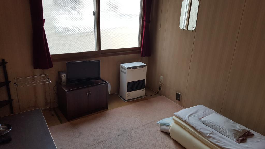 Marutake Ryokan Kutchan Exteriör bild