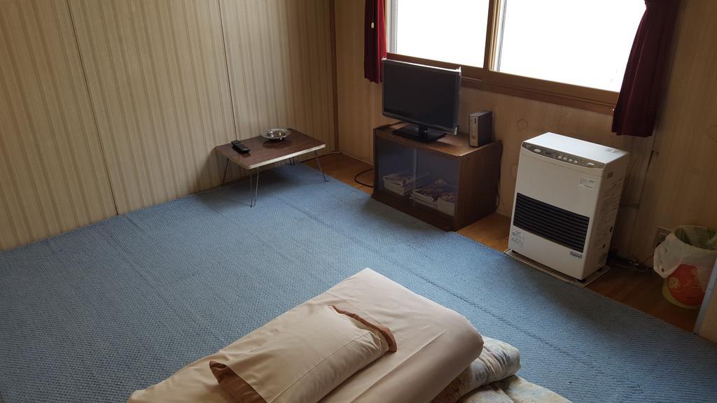 Marutake Ryokan Kutchan Exteriör bild